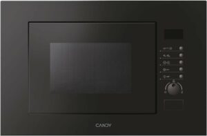 Forno Microonde Candy MikrobangÄ— MIC20GDFN in uso, mostrando il design elegante e moderno