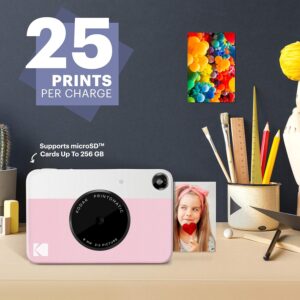 Fotocamera Kodak Printomatic a stampa istantanea in rosa con foto adesive Zink 2x3".  