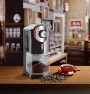 Melitta Macinacaffè Molino 1019-01, macinacaffè elettrico con disco abrasivo piatto e design nero/rosso opaco.