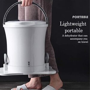 Mini lavatrice portatile verde con manovella e centrifuga, ideale per spazi ridotti e campeggi
